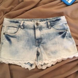 Jean shorts with lacy trim.